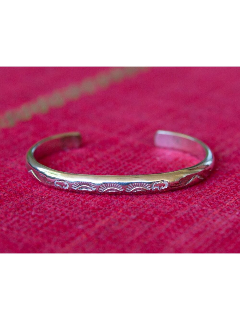 Vintage Navajo Sterling Silver Cuff Bracelet with stamped sun and bison designs